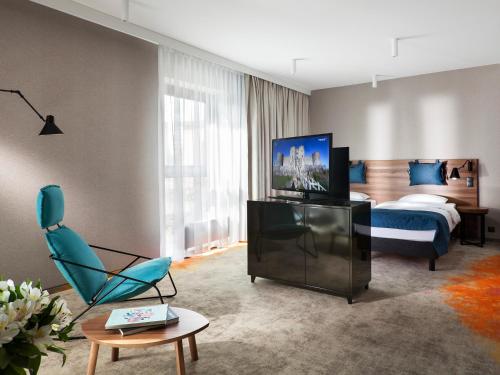 TV a/nebo společenská místnost v ubytování Hotel Sadova