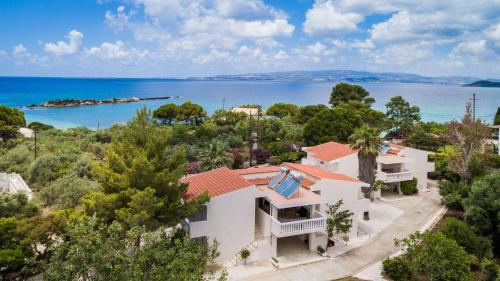an aerial view of a house with a view of the ocean at Sunset Beach Appartments in Minia