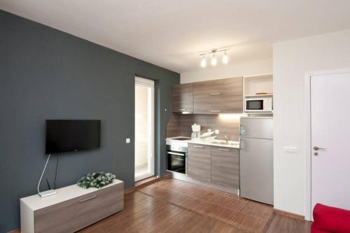 A kitchen or kitchenette at Sofia Top Lux Apartment
