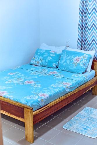 מיטה או מיטות בחדר ב-Residences Mangrove