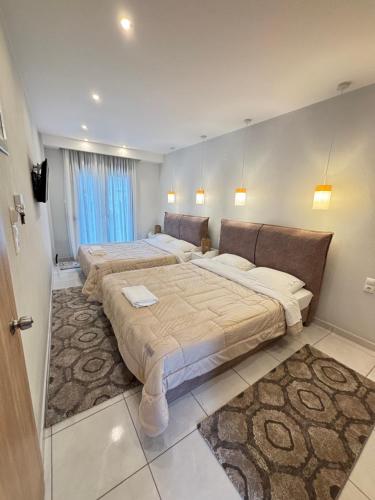 Krevet ili kreveti u jedinici u objektu Minas Luxury Studios