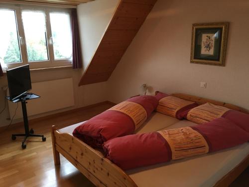 Postel nebo postele na pokoji v ubytování Landgasthof Winzelnberg