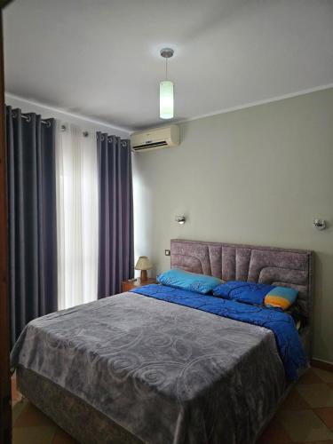 Katil atau katil-katil dalam bilik di Villa Premium