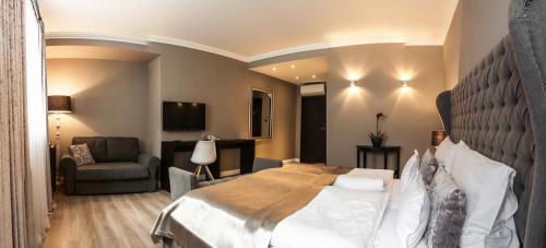Postel nebo postele na pokoji v ubytování Hotel Rango
