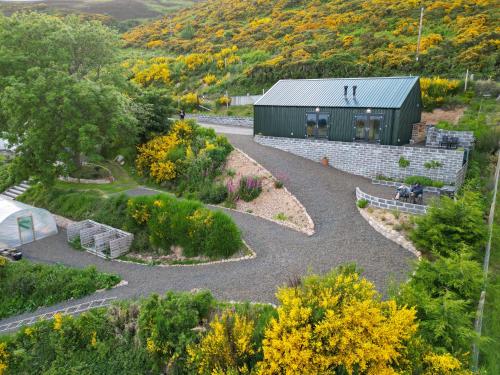 an overhead view of a garden with a building at Lothmore Lookout - Sunrise in Kilmote