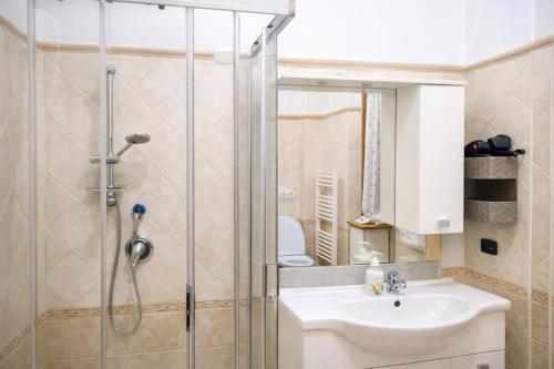 a bathroom with a shower and a sink at Golden Stay Rome - Golden Room - Close to Metro C in Tor Vergata