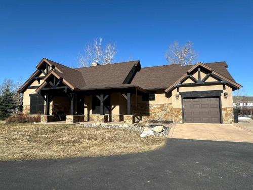 a large house with a garage at Rock Creek Escape in Red Lodge