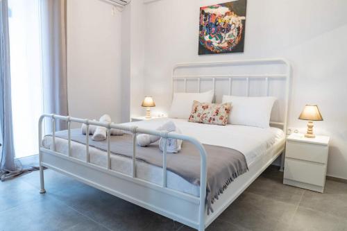 Ένα ή περισσότερα κρεβάτια σε δωμάτιο στο Casa Anavyssos