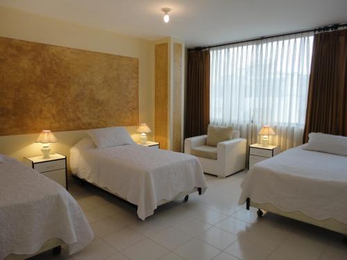 Ένα δωμάτιο στο HOTEL MAISON FIORI (Centro)