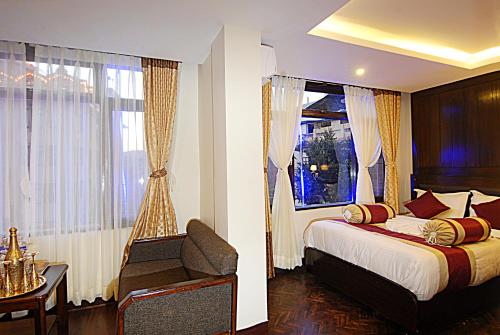 Postel nebo postele na pokoji v ubytování Hotel Buddha