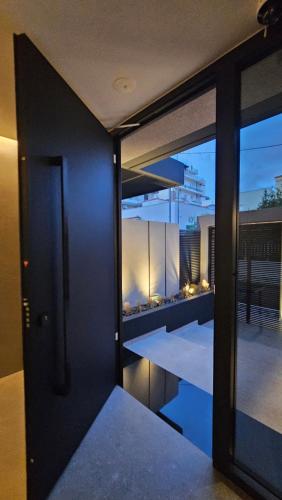 a view of a house with a view of a pool at Kalvokoresi 16 I Premium Apartments in Chios