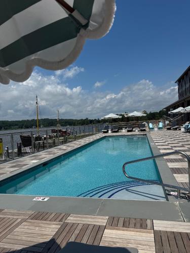 a swimming pool on top of a cruise ship at Delamar Mystic in Mystic