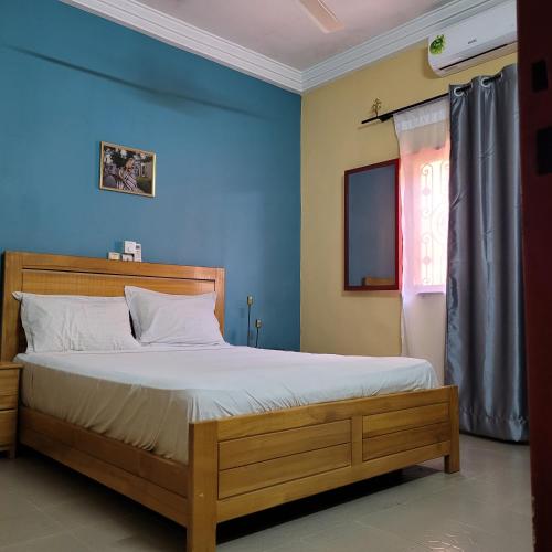 Llit o llits en una habitació de Maison Altra