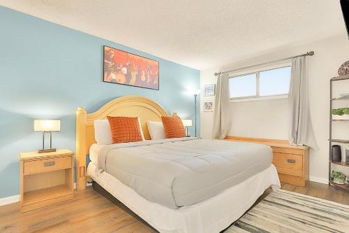 a bedroom with a large white bed and a window at Oceanview King Suite @ Meridian Plaza by Wavecrest Beach Vacations in Myrtle Beach