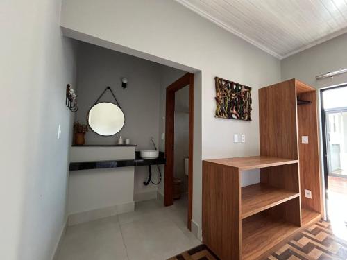 a hallway of a home with a mirror on the wall at Casa Prado in Prado