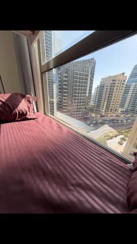 Krevet ili kreveti u jedinici u objektu JBR Shared Hostel Premium