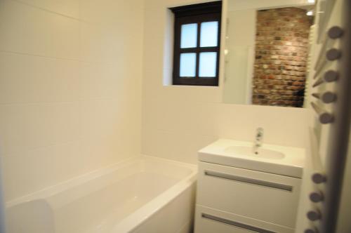 Kylpyhuone majoituspaikassa Holiday Home Poppenhuis