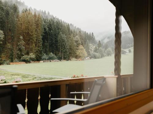 a view of a lake from a balcony at Apartment Hof Obertalgut by Interhome in Teuffenthal