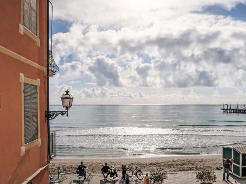 a view of the beach from a building at Apartment Emanuela by Interhome in Alassio