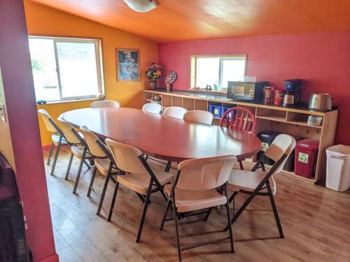 a dining room with a table and chairs at MobyDick Hostel in Seward