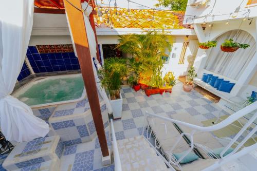 a view of a house with a swimming pool at Selva María Hotel Boutique in Santa Fe de Antioquia