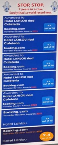 a screenshot of a sign with a stop sign at Hotel LAHLOU riad Cafeteria in Oujda
