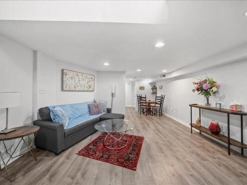 a living room with a couch and a table at May House in Washington, D.C.