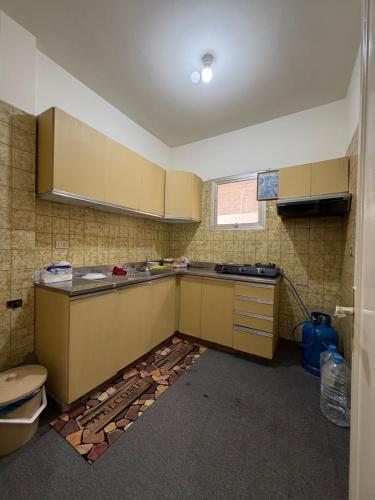 an empty kitchen with a sink and a toilet at Faraya square chalet in Fārayyā