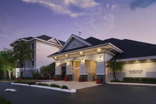 a large white building with a church at Homewood Suites by Hilton Daytona Beach Speedway-Airport in Daytona Beach