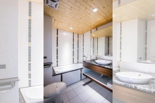 Koupelna v ubytování Han She Hotel