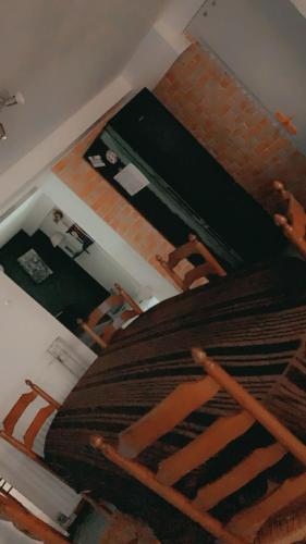 a view of a bedroom with a bed and a fireplace at Rez chaussée transformé en t4 au 114 Avenue de juvisy cottages in Juvisy-sur-Orge