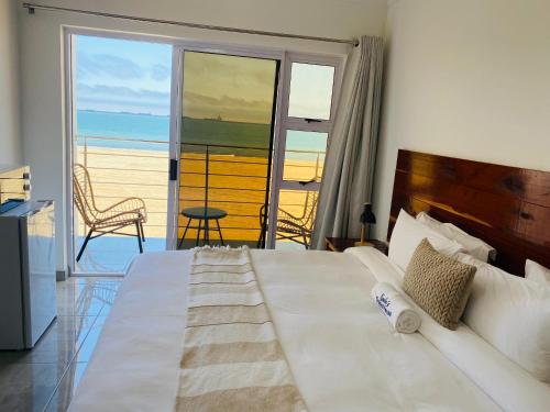 Llit o llits en una habitació de Sacky's Guesthouse