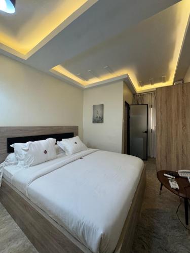 เตียงในห้องที่ SLAR Résidence