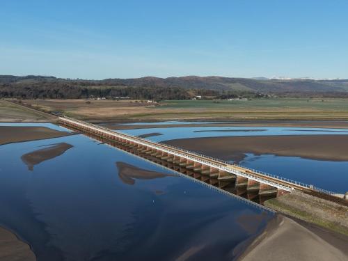an aerial view of a bridge over a body of water at Ye Olde Fighting Cocks in Arnside