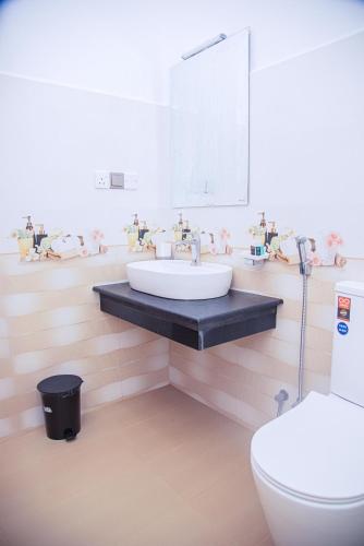 a bathroom with a sink and a toilet at Scenic View - Ella in Ella
