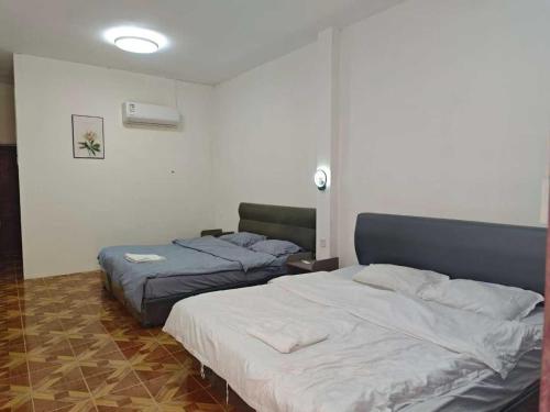 Llit o llits en una habitació de MIti hotel