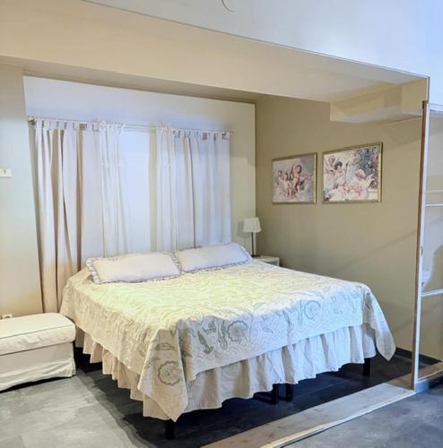 a bedroom with a large bed in a room at Helsingebockens Fastigheter in Bollnäs