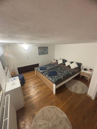 a bedroom with a large bed in a room at Holiday loft U Kotynku in Veselí nad Lužnicí
