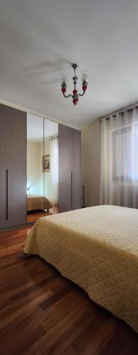 a bedroom with a large bed and a ceiling at La Casa delle Liane in Galatina