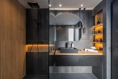 a bathroom with a sink and a mirror at Green House - why not in Kismaros