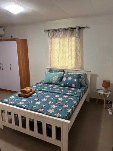 Llit o llits en una habitació de Mangrove Residence 2