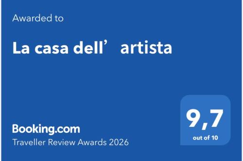 a blue rectangle with the words la casa delphi australia at La casa dell’artista in Assisi