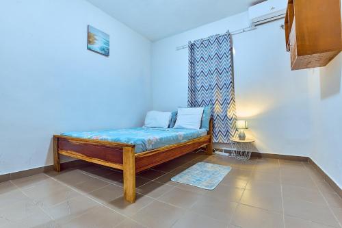 Llit o llits en una habitació de Mangrove Residence
