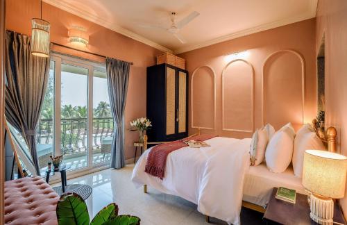 a bedroom with a bed and a balcony at Casa Superfly 2BHK with Rooftop Jacuzzi & Terrace Deck Excellent Location Boilermaker Thalassa in Oxel