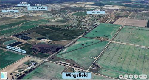 an aerial view of a city with farms and fields at Wings Field - relaxing family farm stay in Tocumwal