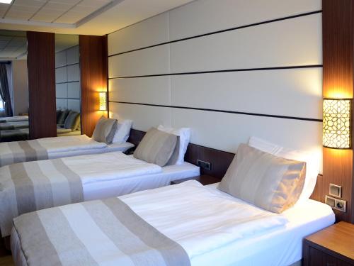Katil atau katil-katil dalam bilik di Safa Royal Museum Hotel