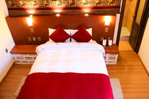 Postel nebo postele na pokoji v ubytování Hotel Palacio de Sal