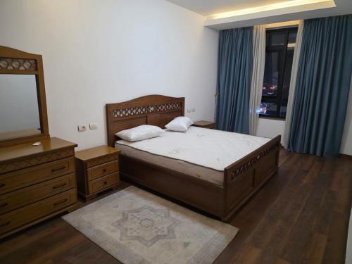 Llit o llits en una habitació de Noiré Luxe
