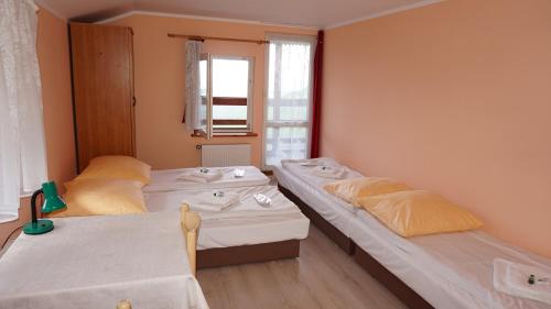 Katil atau katil-katil dalam bilik di Chata Na Przełęczy