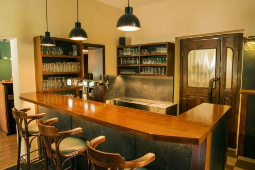 Lounge nebo bar v ubytování Studia a apartmány U Karla